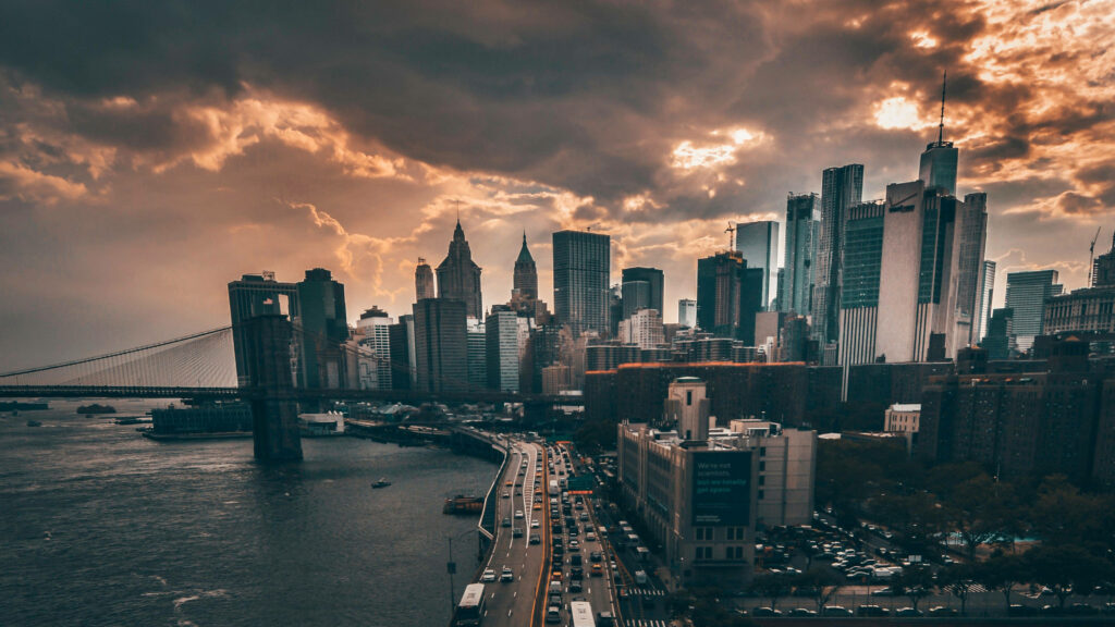 Dramatic Manhattan Wallpaper: Dark Sky, Skyscrapers, & Brooklyn Bridge