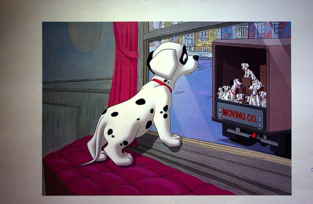 Pawsome: Adorable Dalmatian Puppies in Perfect Formation - A Captivating Snapshot from Disney's 101 Dalmatians Wallpaper