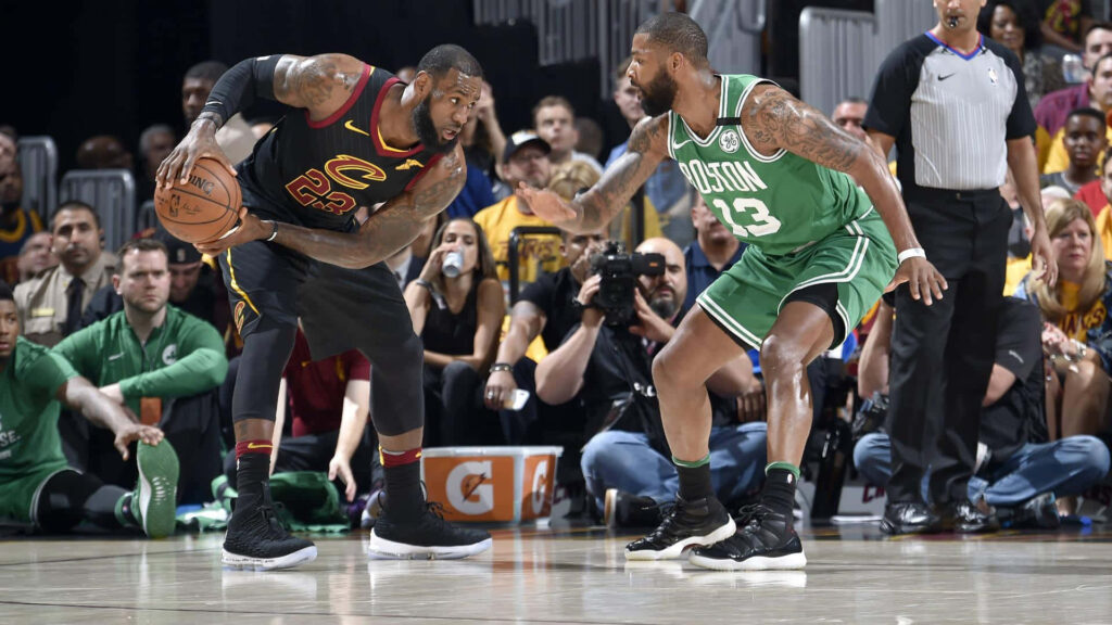 Marcus Morris defends LeBron James in Celtics vs Cavaliers intense NBA game wallpaper background