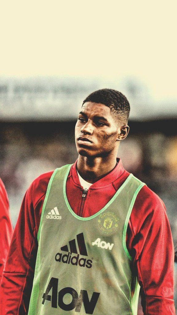 Marcus Rashford young Manchester United training top green Adidas bib intense football portrait Wallpaper