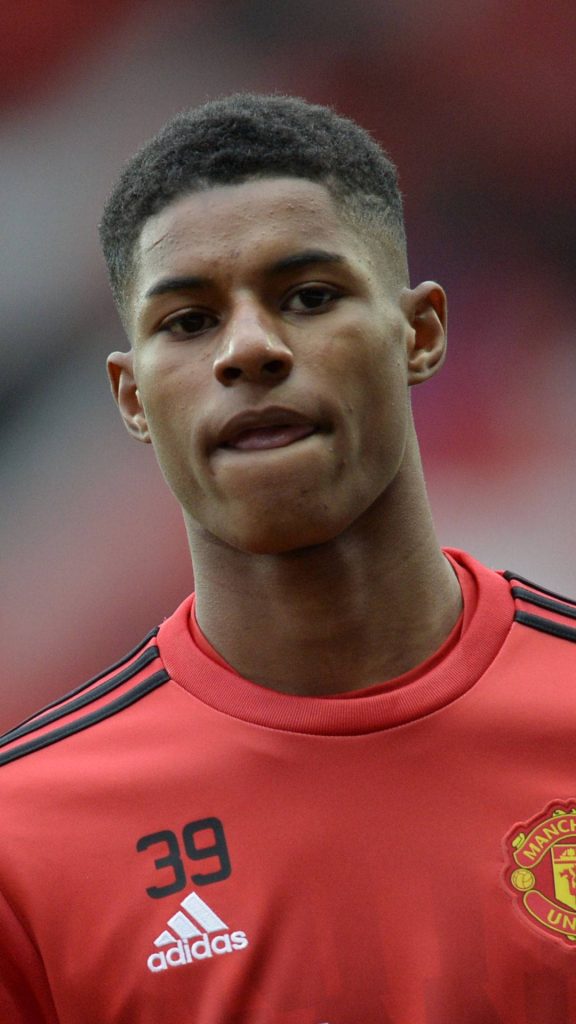 Marcus Rashford close-up portrait in Manchester United red training kit number 39 wallpaper
