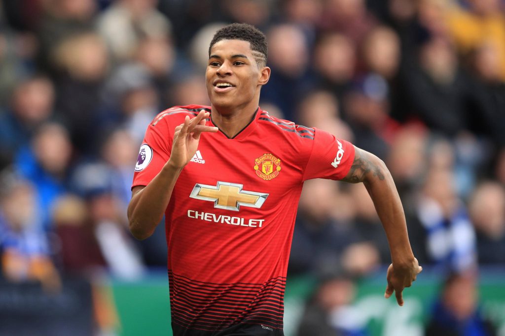 Marcus Rashford running in Manchester United red kit Chevrolet sponsor high-resolution wallpaper