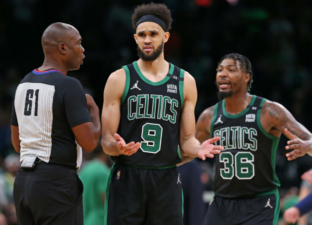 Marcus Smart and Jaylen Brown Boston Celtics frustrated during intense NBA game with referee Wallpaper