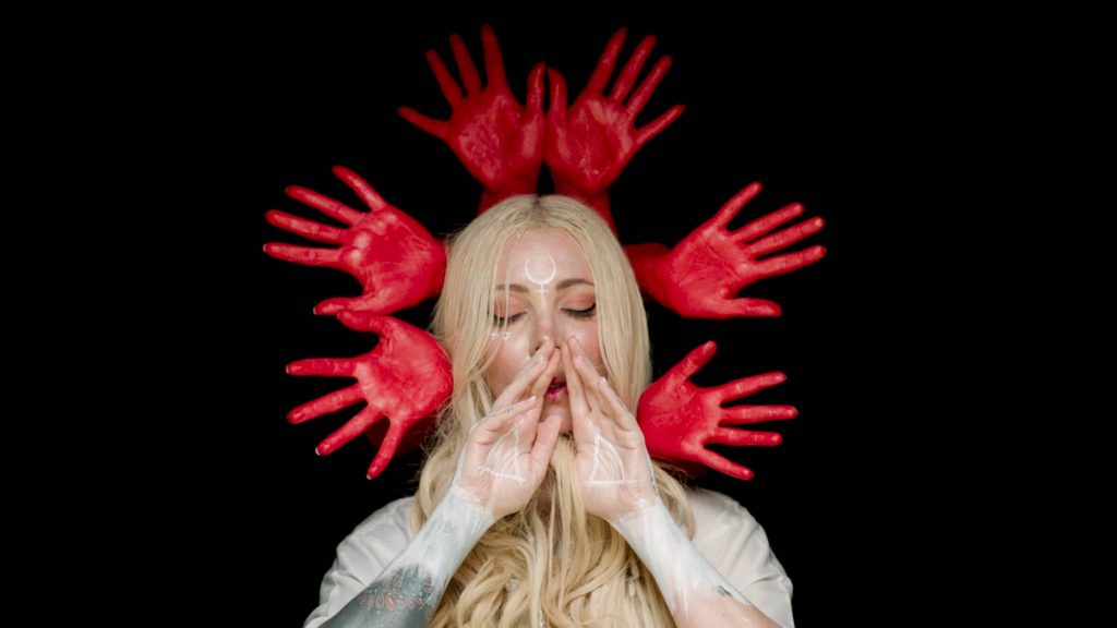 Maria Brink In This Moment wallpaper dark mystical white markings red hands halo background