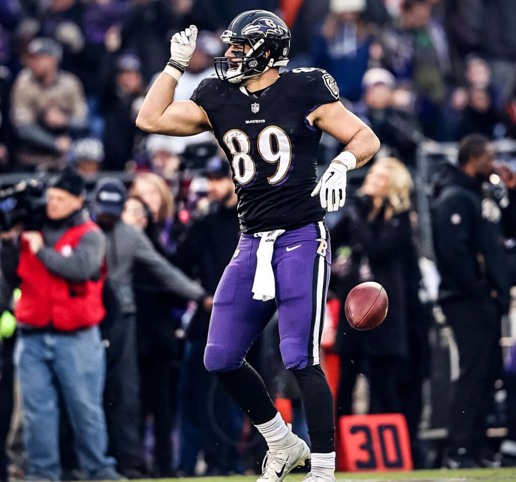 Mark Andrews Baltimore Ravens football player celebrating on field intense action game wallpaper