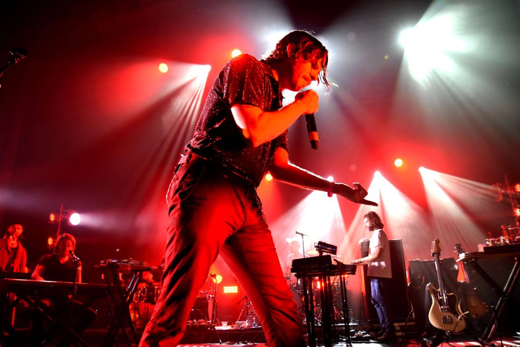 Mark Foster live concert photo red stage lighting intense energy band wallpaper background