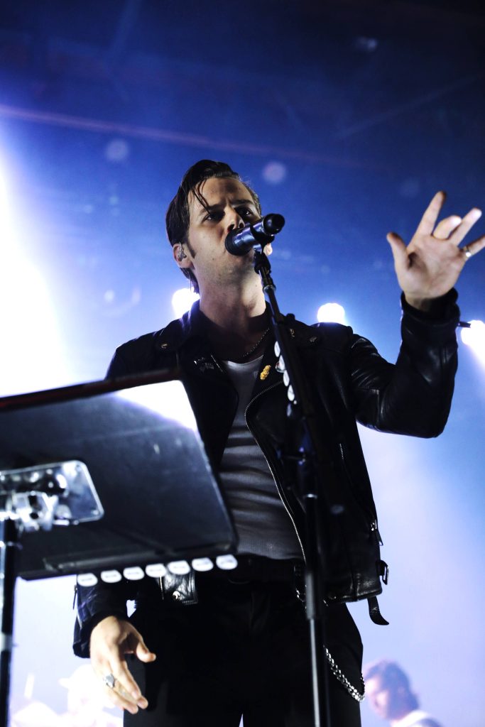Mark Foster live concert photo blue stage lighting black leather jacket edgy music wallpaper