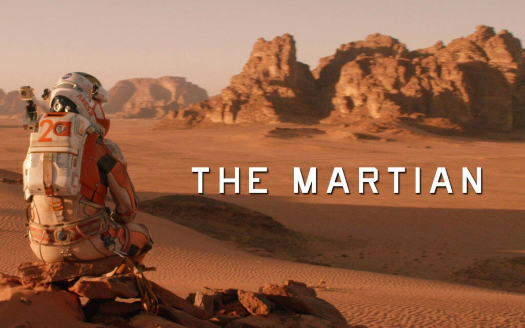 Mark Watney astronaut alone on Mars landscape showing survival and determination wallpaper