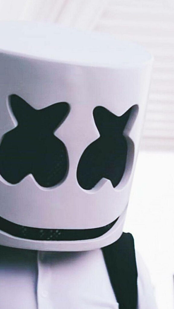 Marshmello in Action: Captivating HD Close-up with Signature Helmet and Backpack on iPhone Background Wallpaper