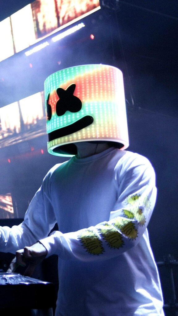 Melodic Marvel: Captivating Marshmello's Mesmerizing Concert Spectacle in Pastel-hued Helmet Wallpaper