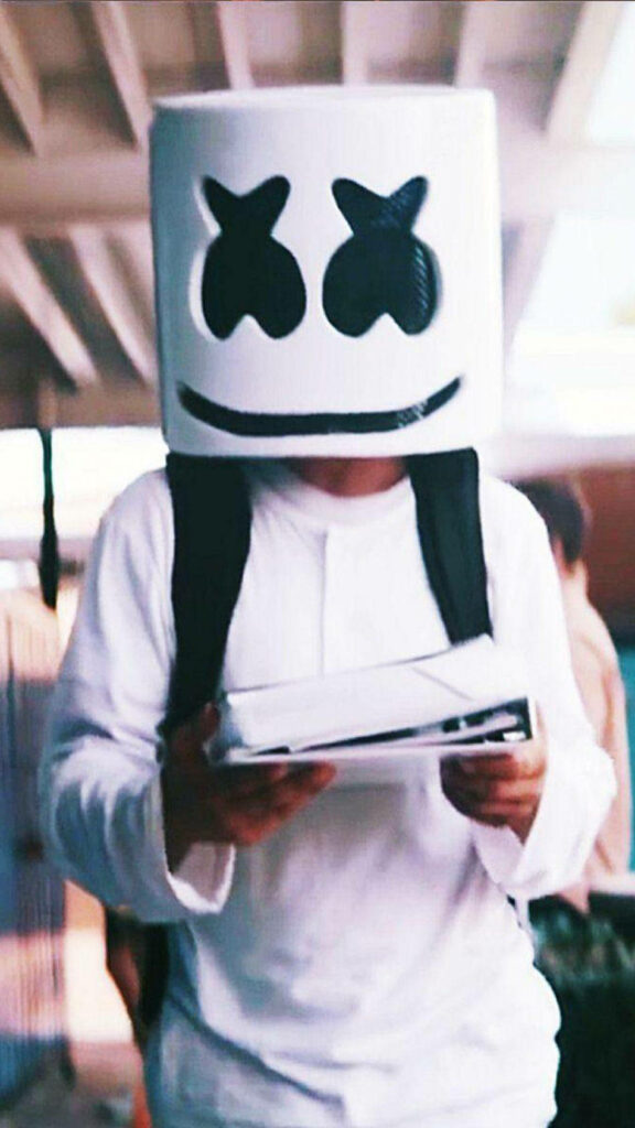 Marshmello's Scholarly Style: Books, Backpack, and All-White Attire iPhone Wallpaper
