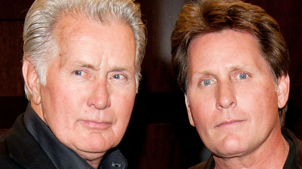 Martin Sheen and Emilio Estevez close-up at 2012 book signing warm lighting candid father son Wallpaper