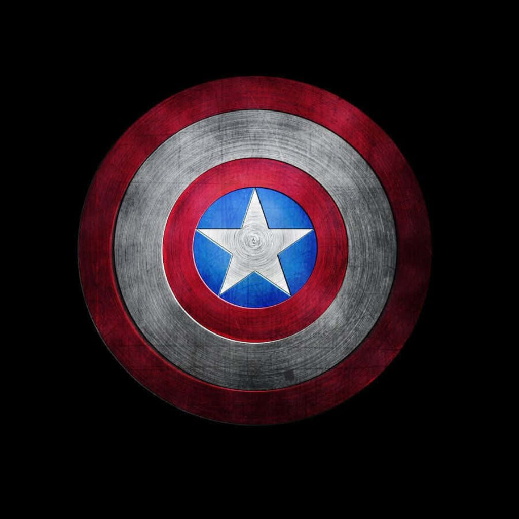 Marvel's Defiant Hero: The Iconic Captain America Logo in a Striking Background Picture Wallpaper