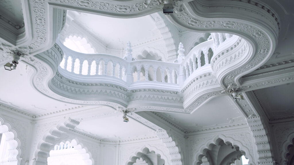 Majestic 4k Architecture Background Showcasing a Delicate White Ceiling Adorned with Exquisite Ornamental Details Wallpaper