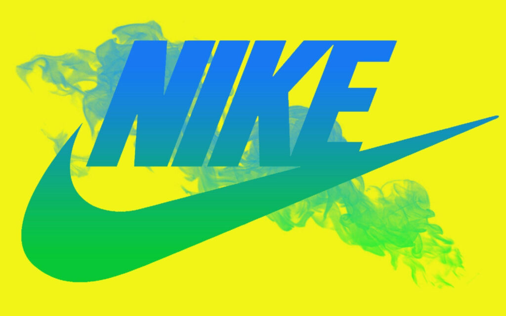 Dynamic Nike Emblem Unveiled on Vibrant Gradient Wallpaper, Embraced by Smoky Yellow Hues