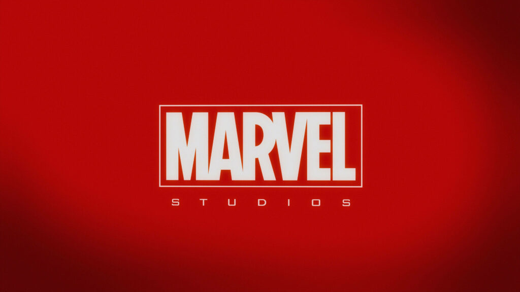Marvelous Marvel Studios: A Pure Red Wallpaper with Bold Font and Iconic Title