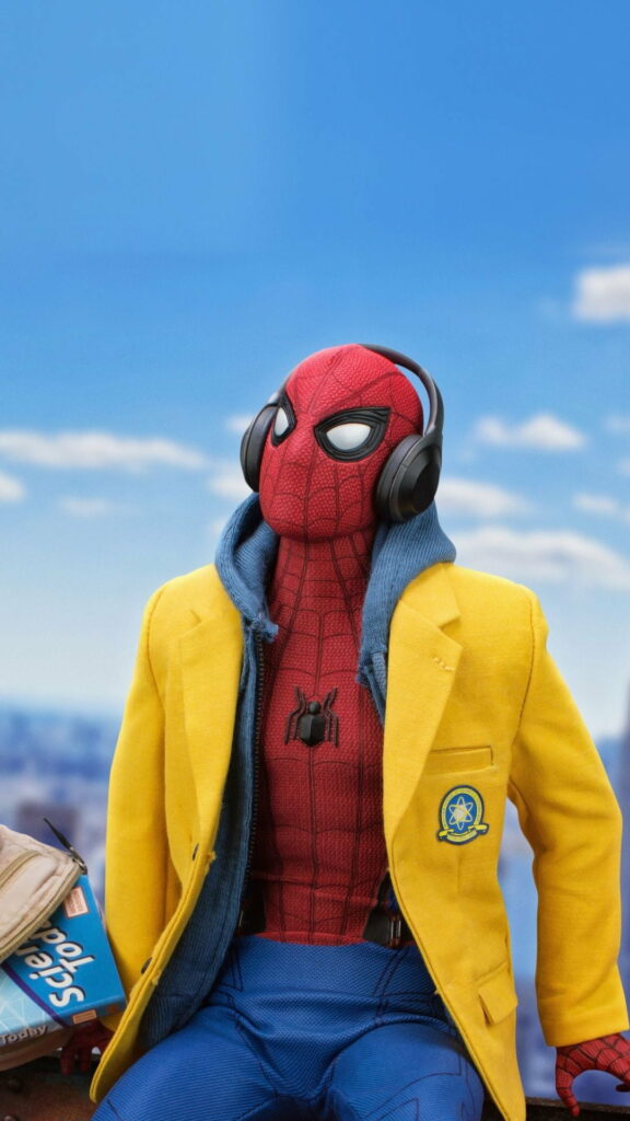 Spider-Man in iconic suit with yellow jacket listens to music under clear blue sky HD wallpaper