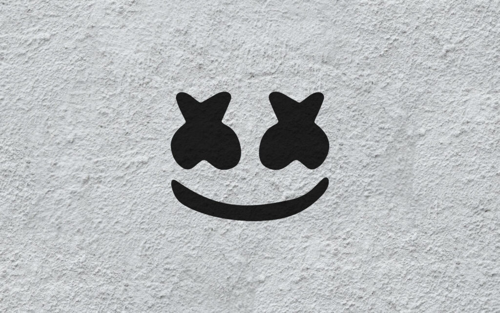 Marshmello DJ: Unleashing Musical Magic on a Textured White Canvas Wallpaper