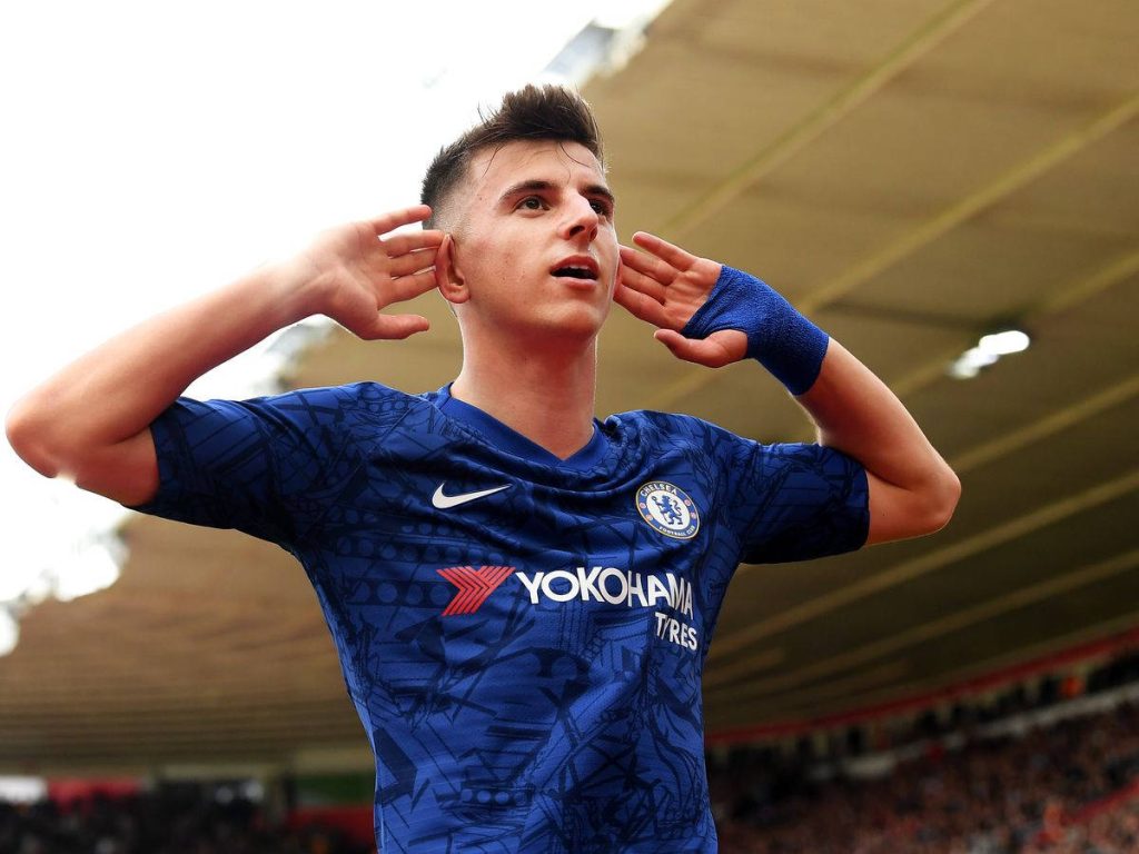 Chelsea star Mason Mount in blue jersey celebrating passionately on the field wallpaper