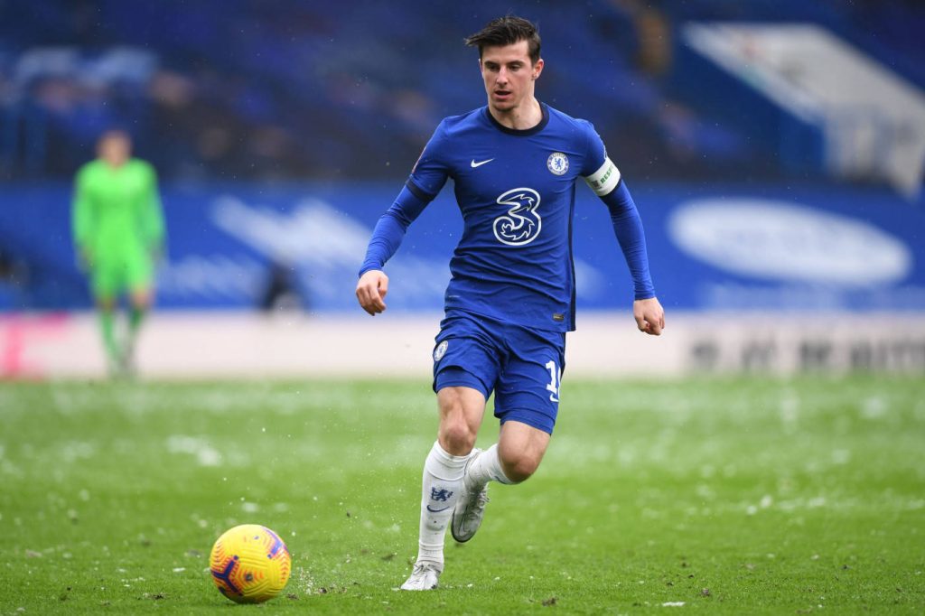 Mason Mount Chelsea FC blue kit dribbling yellow football intense soccer action wallpaper