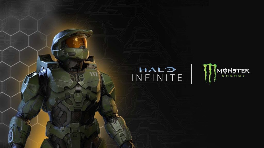 Master Chief in olive-green MJOLNIR armor with Halo Infinite and Monster Energy logos background Wallpaper