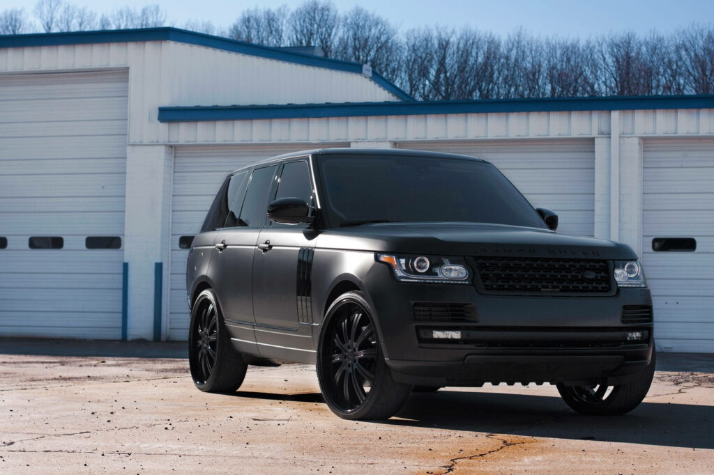 Matte Black Land Rover SUV Wallpaper: Rugged & Refined Style