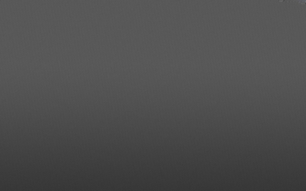 Super matte carbon fiber wallpaper 4K dark gray 2x2 twill weave sleek tech background