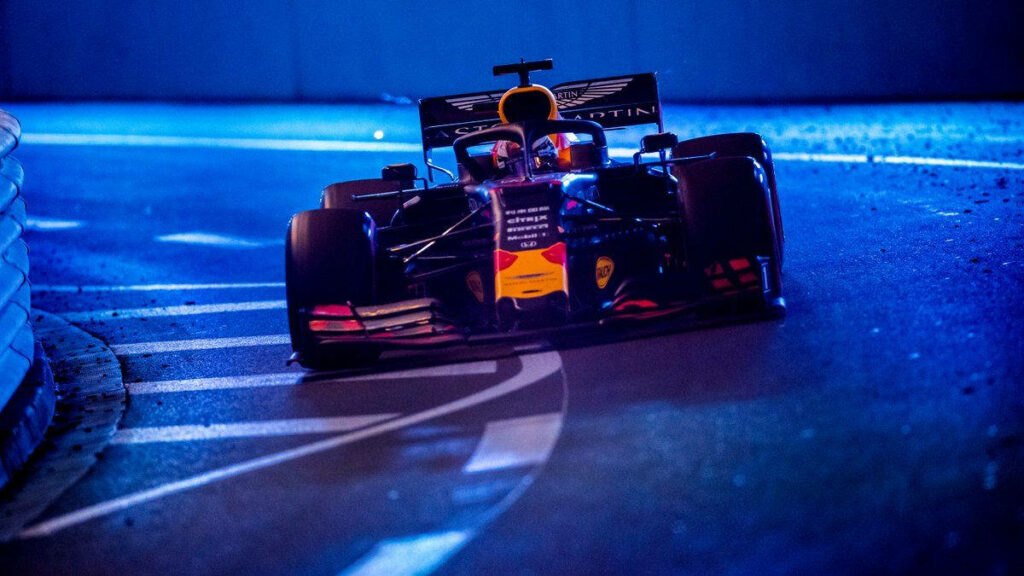 Max Verstappen racing Red Bull car in blue-lit tunnel Monaco Grand Prix 2021 motorsport wallpaper