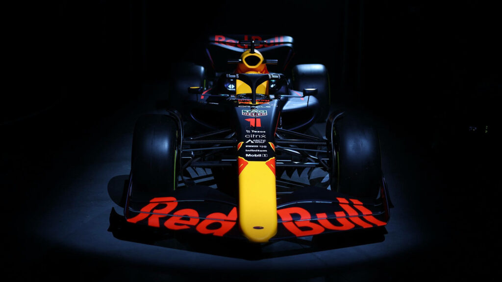 Max Verstappen Red Bull Racing RB18 F1 car in dramatic lighting showcasing aerodynamic design Wallpaper