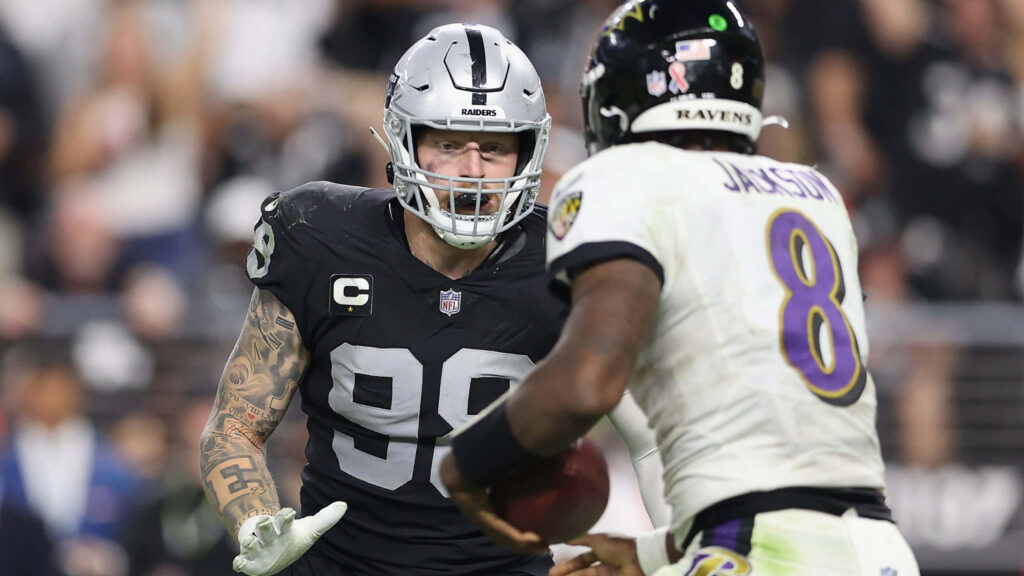 Maxx Crosby of Las Vegas Raiders prepares to defend Lamar Jackson Baltimore Ravens NFL wallpaper