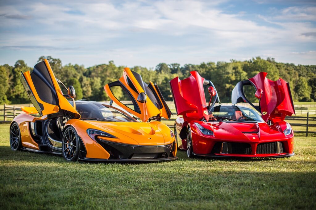 McLaren P1 & Ferrari LaFerrari: Supercars in a Lush Greenery Wallpaper