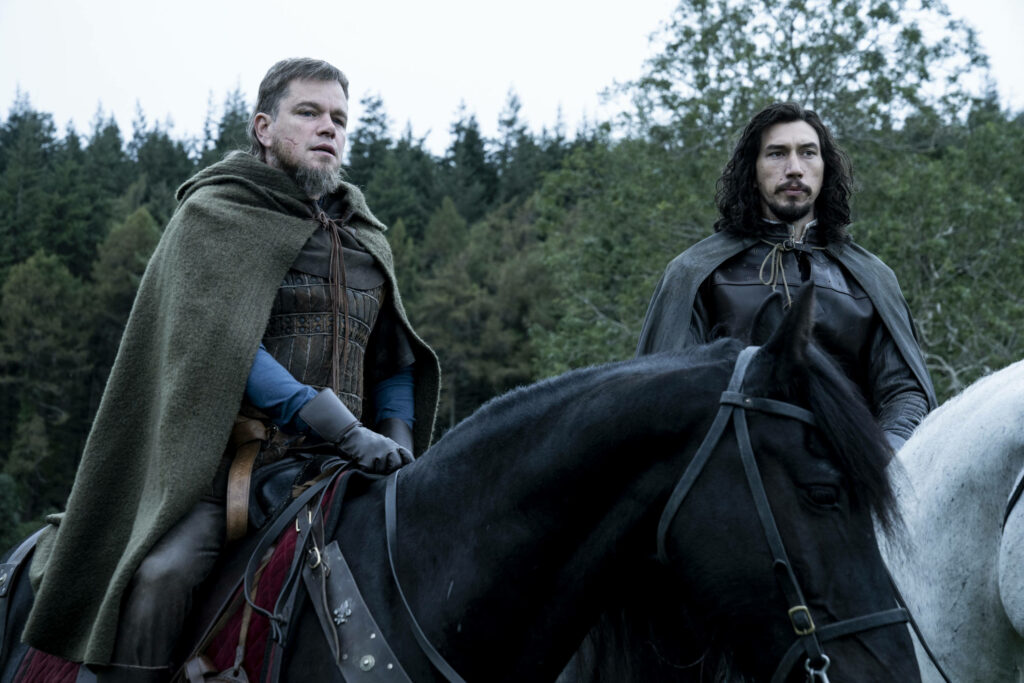 Medieval Duel Wallpaper: Matt Damon & Adam Driver in Epic Forest Scene