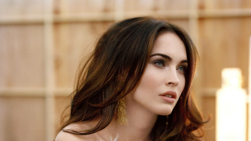 Megan Fox elegant portrait with gold earrings stunning wallpaper background image