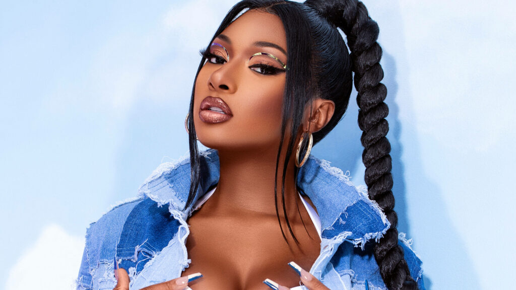 Megan Thee Stallion's Chic Denim Look: Confidence & Glam Wallpaper