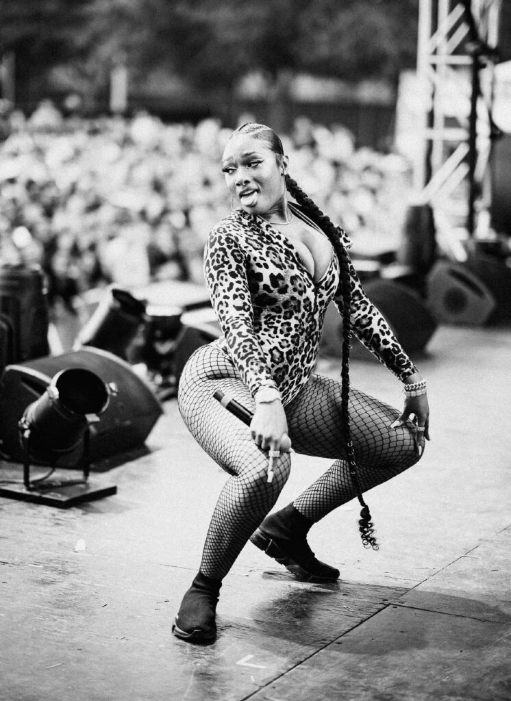 Megan Thee Stallion: Bold Leopard Print Performance Wallpaper
