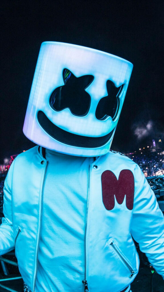 Melodic Marshmello: A Vibrant Iphone Wallpaper Showcasing the Iconic DJ Sporting a Stylish Bomber Jacket