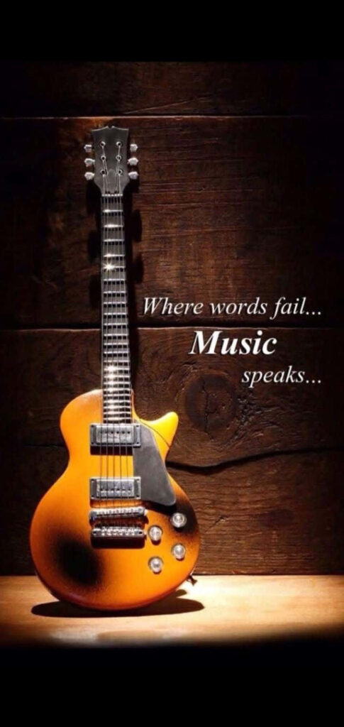 Harmony in Silence: An Electric Symphony of Words and Music Wallpaper