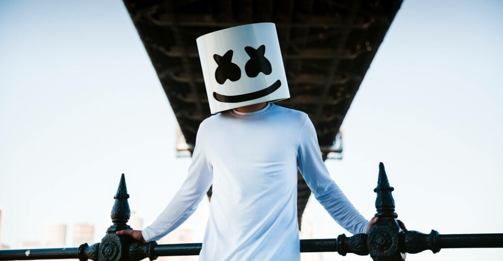 Melodic Marshmallow: A Groovy DJ Creates Beats in a Sleek White Sweater [Wallpaper]
