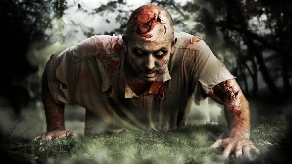 The Terrifying Dominance: Men Unleashing Strength and Aggression Amidst Horror Zombie Invasion Wallpaper