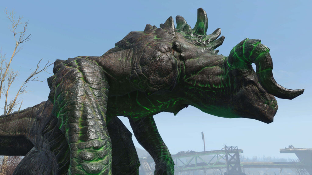 Menacing Fallout Deathclaw with green patterns in post-apocalyptic landscape wallpaper background