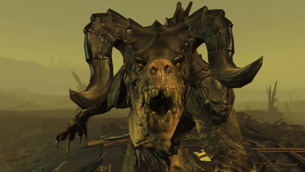 Fallout Deathclaw with massive claws and armored scales under a post-apocalyptic yellow sky wallpaper