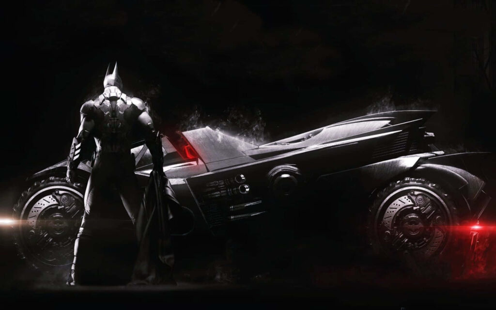 Gotham's Guardian: The Majestic Batmobile Silhouetted Against the Urban Skyline Wallpaper
