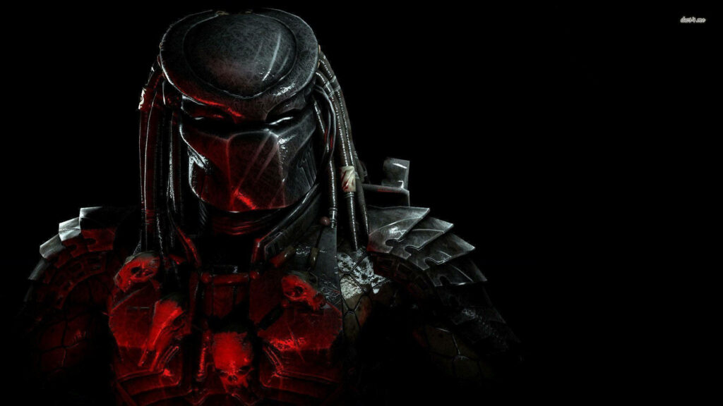 Menacing Predator in shadows with armored body and glowing red light intense wallpaper