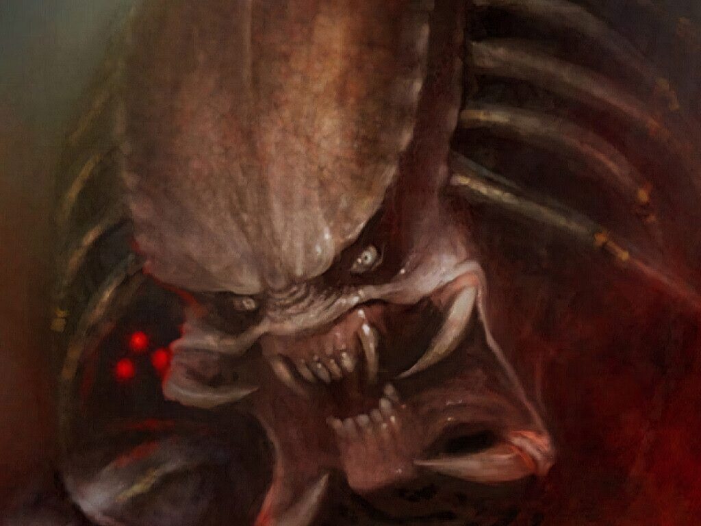 Menacing Predator with sharp teeth intense stare chilling monster face horror wallpaper background