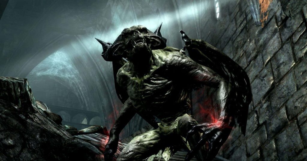 Menacing Skyrim stone gargoyle with leathery wings and glowing red aura in gothic castle Wallpaper