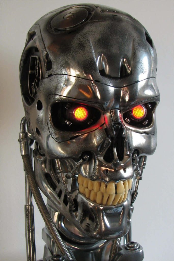 T-800 Terminator Endoskeleton wallpaper with glowing red eyes and detailed chrome skull design