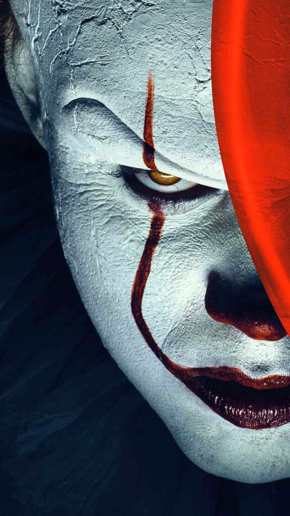 Pennywise's Menacing Presence Captured in an Incredible Close-up Portrait Wallpaper