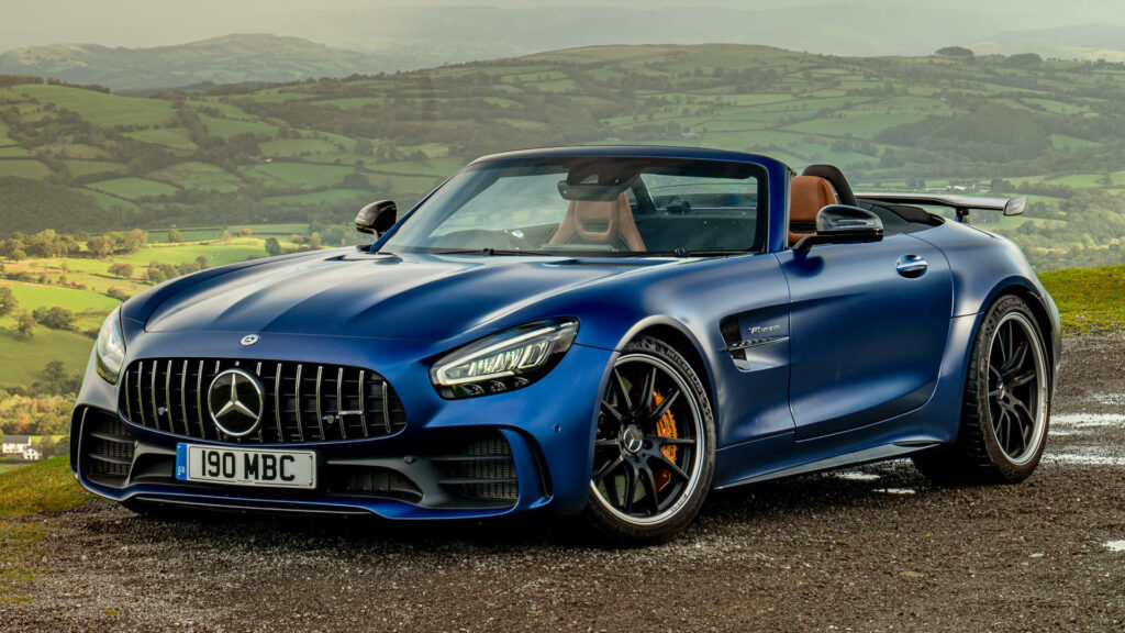 Mercedes-AMG GT R Blue Convertible parked in scenic countryside showcasing sleek sporty design Wallpaper