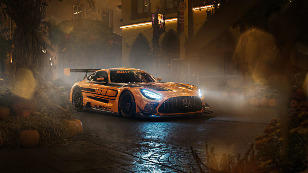 Mercedes AMG GT R racing through misty pumpkin decorated street at night Halloween wallpaper