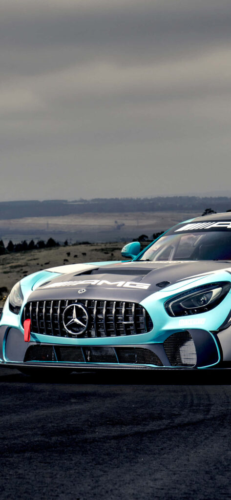 Mercedes AMG GT4 Petronas blue silver racing car aggressive front design outdoor wallpaper background